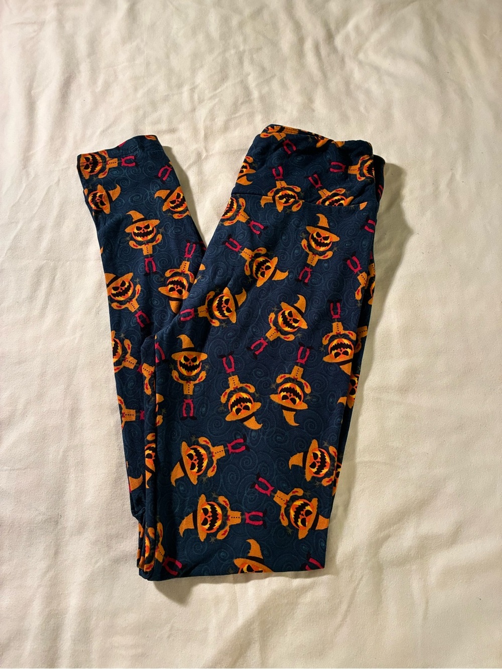 LuLaRoe Navy Leggings with Orange Pumpkin Accent Print